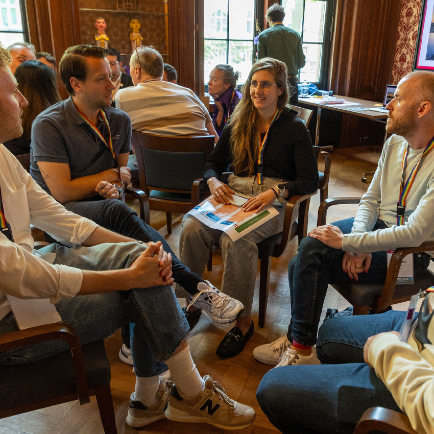 20251209-featurenumbers-1 Breakout room with participants at Workplace Pride Conference 2025